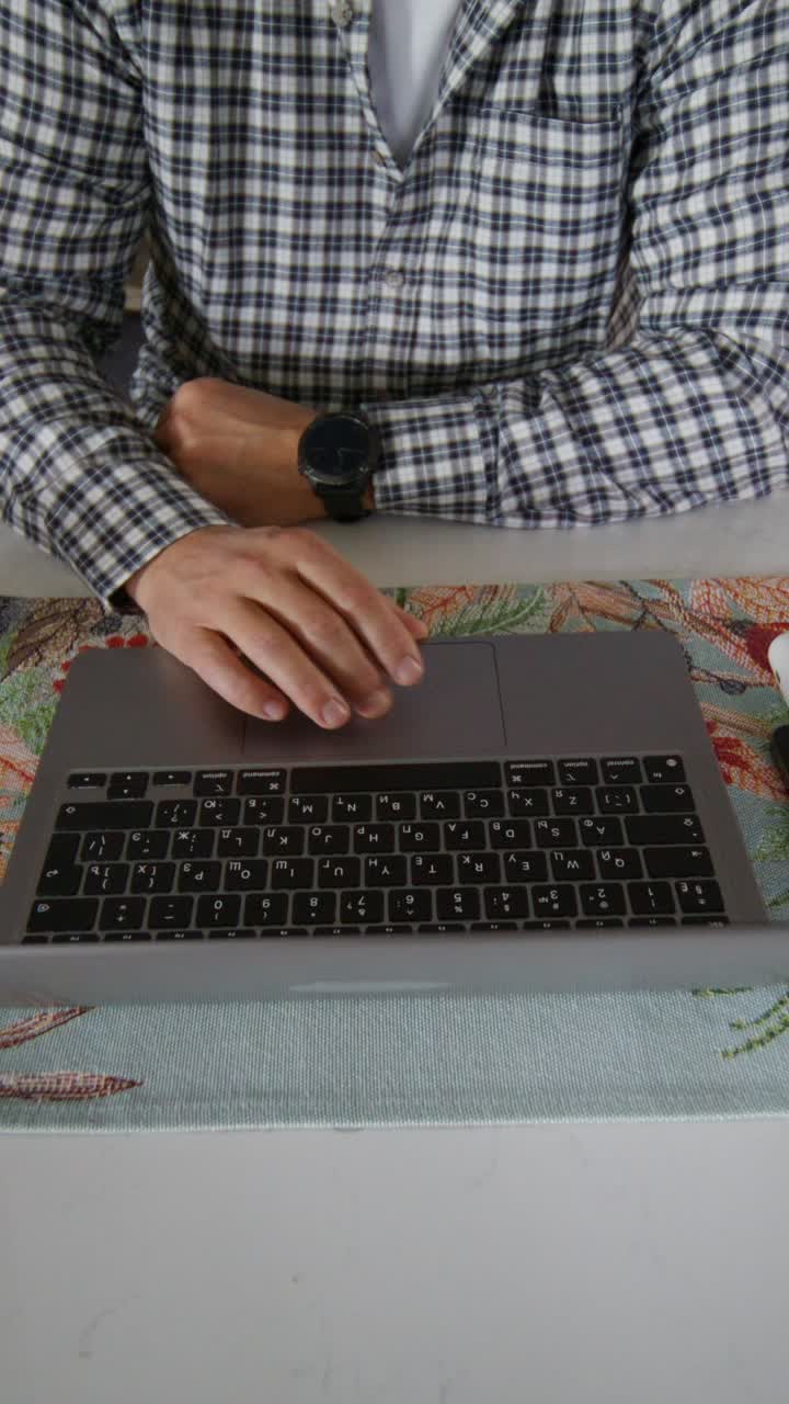 Man Sitting in Living Room