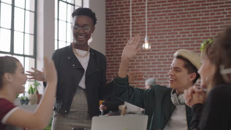 happy group of business students celebrating successful project african american team leader woman sharing exciting victory friends enjoying teamwork togetherness in multi ethnic office meeting