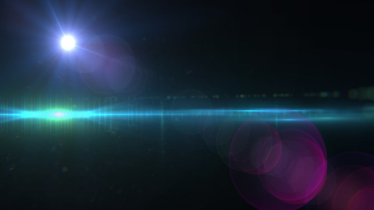 검은 바탕에 빛의 반점과 빛의 흔적