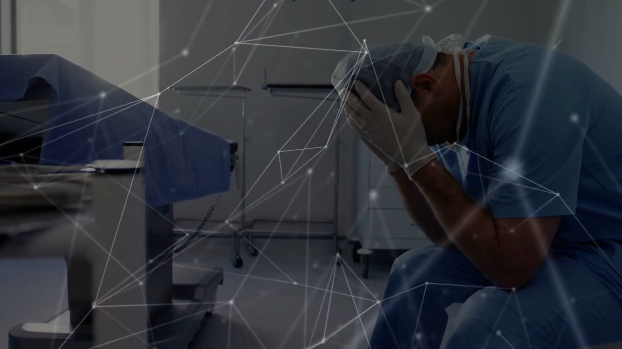 Slumping scrubbed surgeon, after surgery, burying face at operating table, overlay, copy space