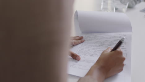 professional business people signing contract deal writing signature on corporate paperwork enjoying successful partnership deal client shaking hands in office boardroom meeting close up hands