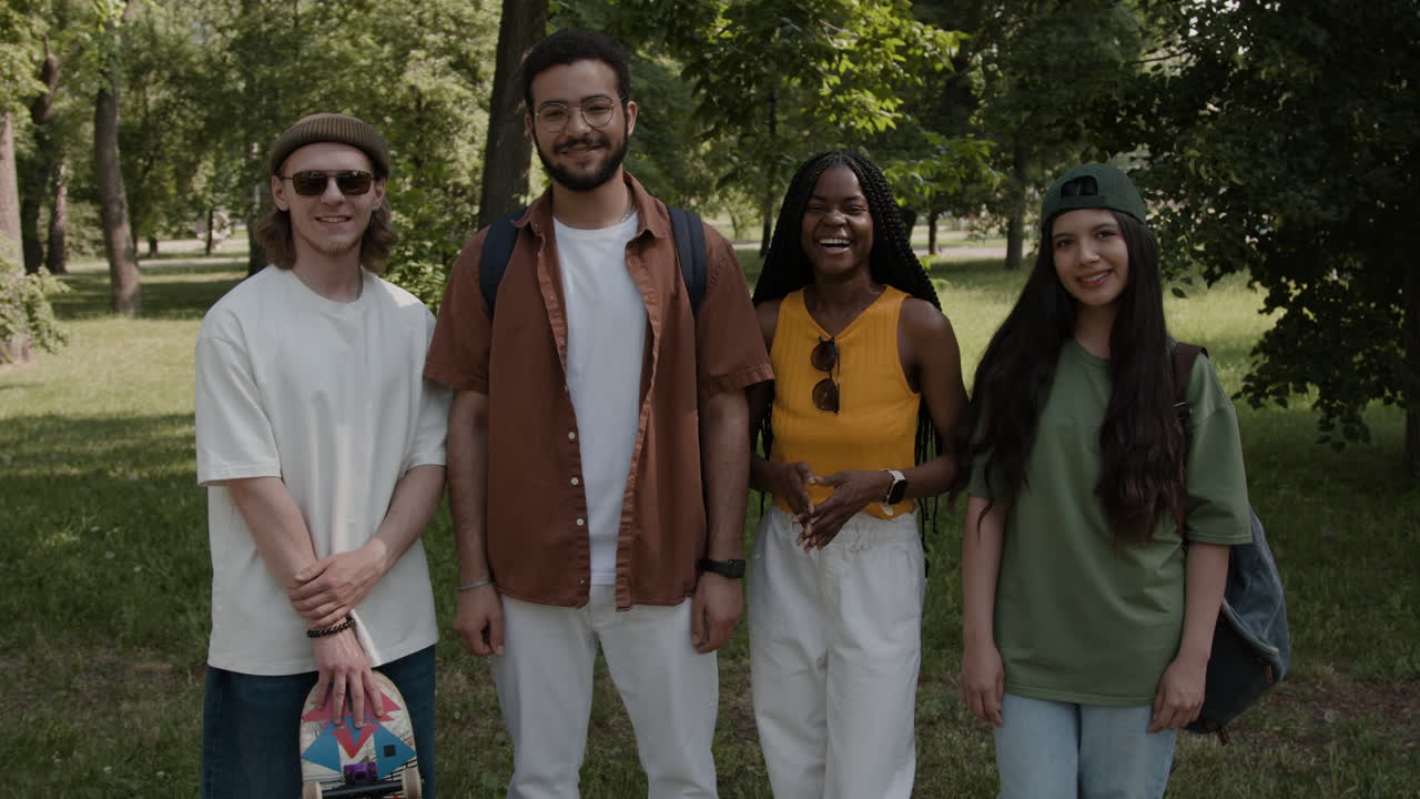 Diverse Group of Young Adults Smiling in a Park