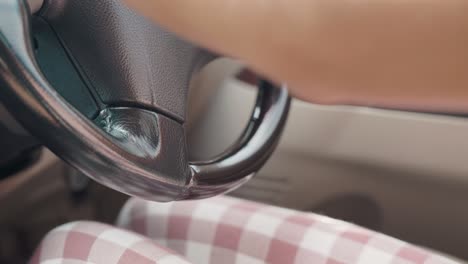 woman sitting relaxed on the seat she driving a car arone on road