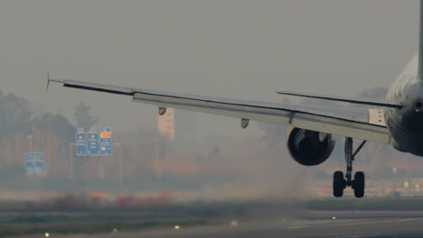 airplane landing in foggy conditions