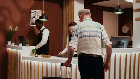 elderly person arriving at hotel