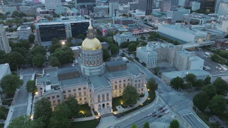 Aerial-footage-of-the-Capitol-Building-in-downtown-Atlanta,-Georgia-at-dusk