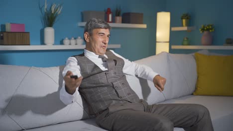 the old man watching tv says wow.