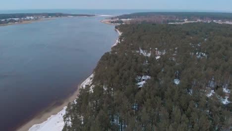 latvia landscape of the lielupe river river shoreline in the winter, aerial