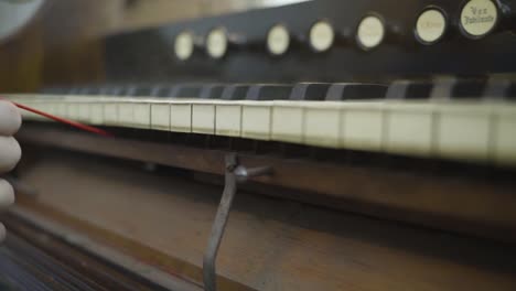 Cleaning-a-Vintage-Antique-Parlor-Organ-with-Canned-Air