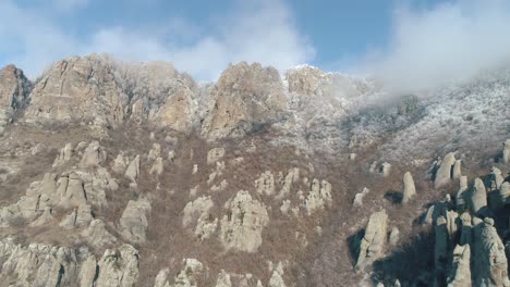 snowy mountain peaks and rocky terrain