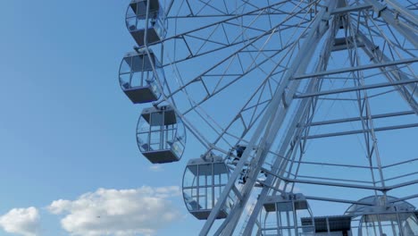 ferris wheel against the blue sky.