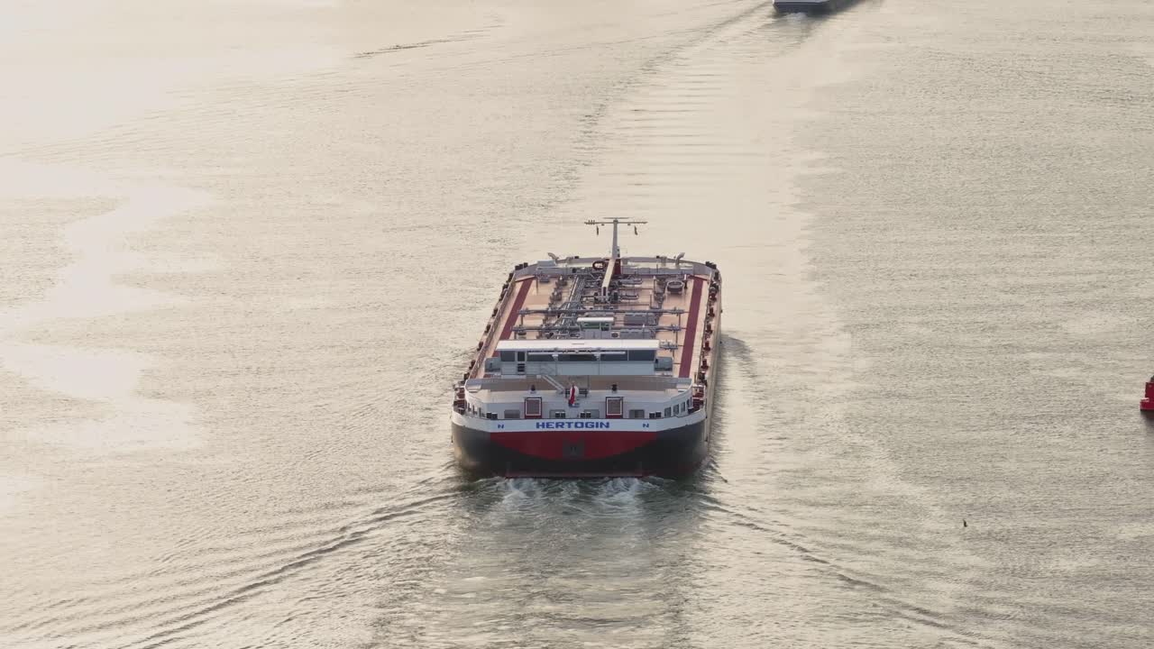 Cargo Ship 'HERTOGIN' Navigating on Water