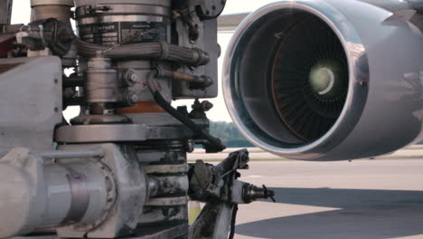 airplane landing gear and jet turbine on tarmac repairs