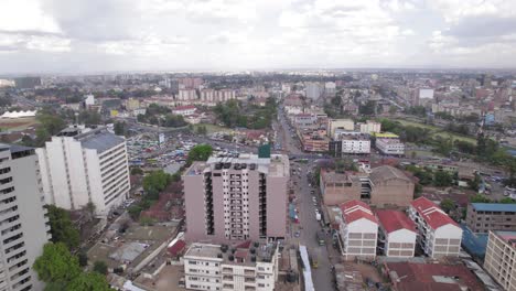 aerial drone footage of moving traffic in nairobi city ngara figtree junction