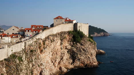 View-On-Dubrovnik-Old-Town-Wall-On-A-Late-Afternoon-In-Croatia---drone-shot