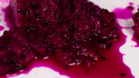 dragon fruit pulp spreads and releases juice