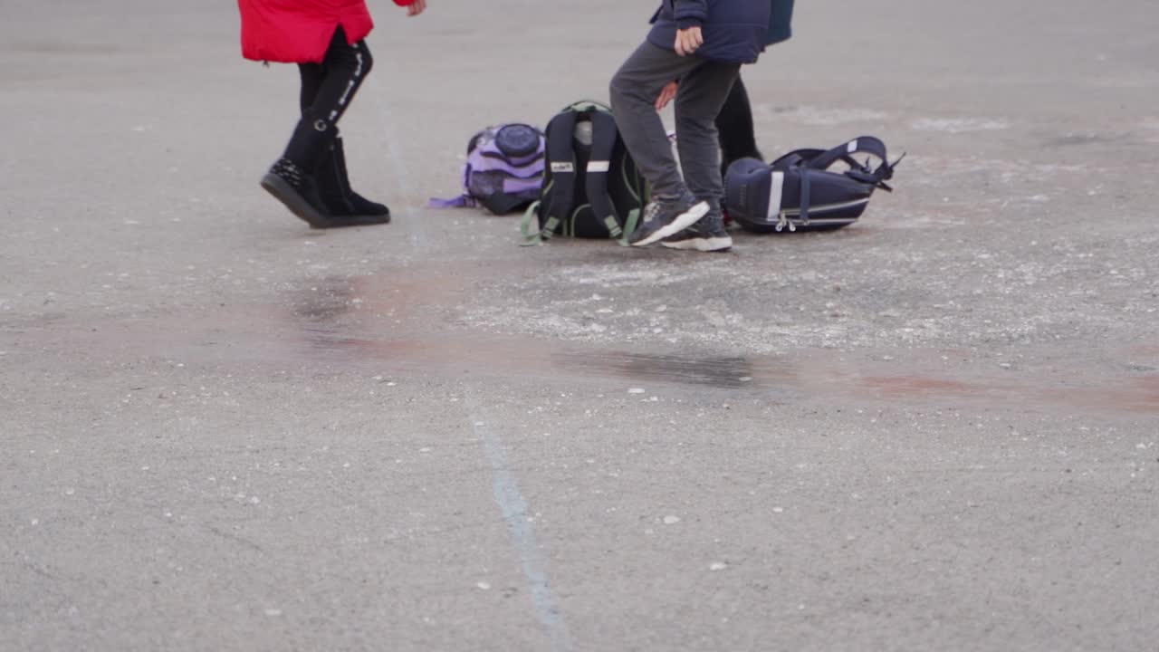 Children Waiting Outside in Winter