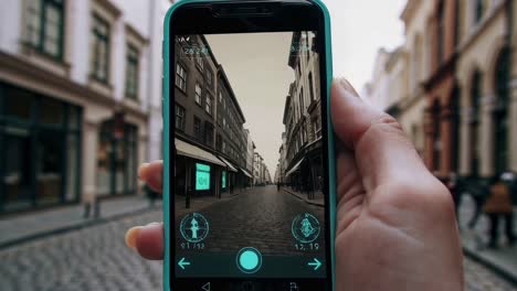 smartphone with ar navigation app in european city street