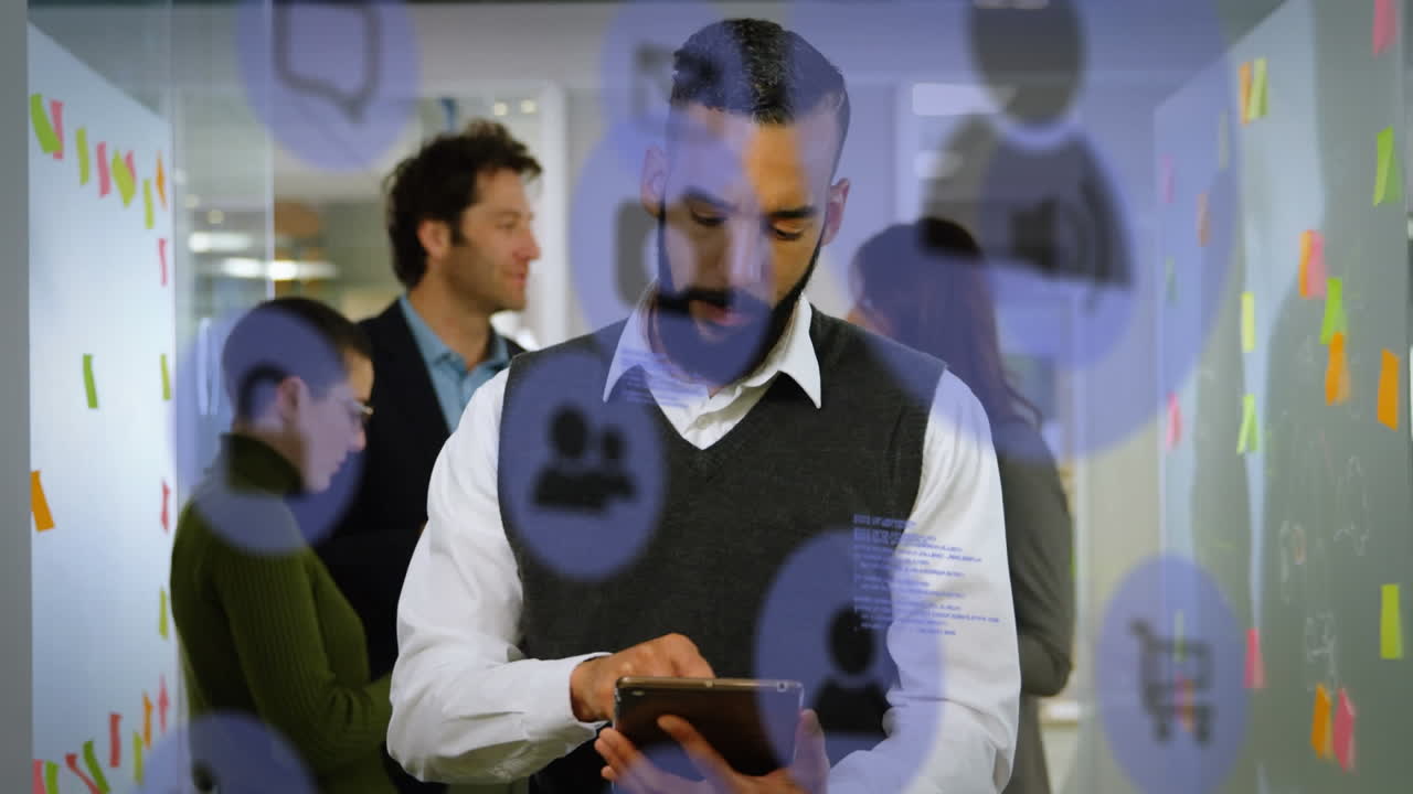 Animation of network of digital icons over businessman using tablet computer