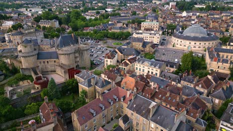 backward aerial movement from the castle of the dukes of alencon with wheat market, alencon, orne, france