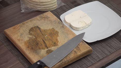 Mexican-cheese-cut-on-a-wooden-board