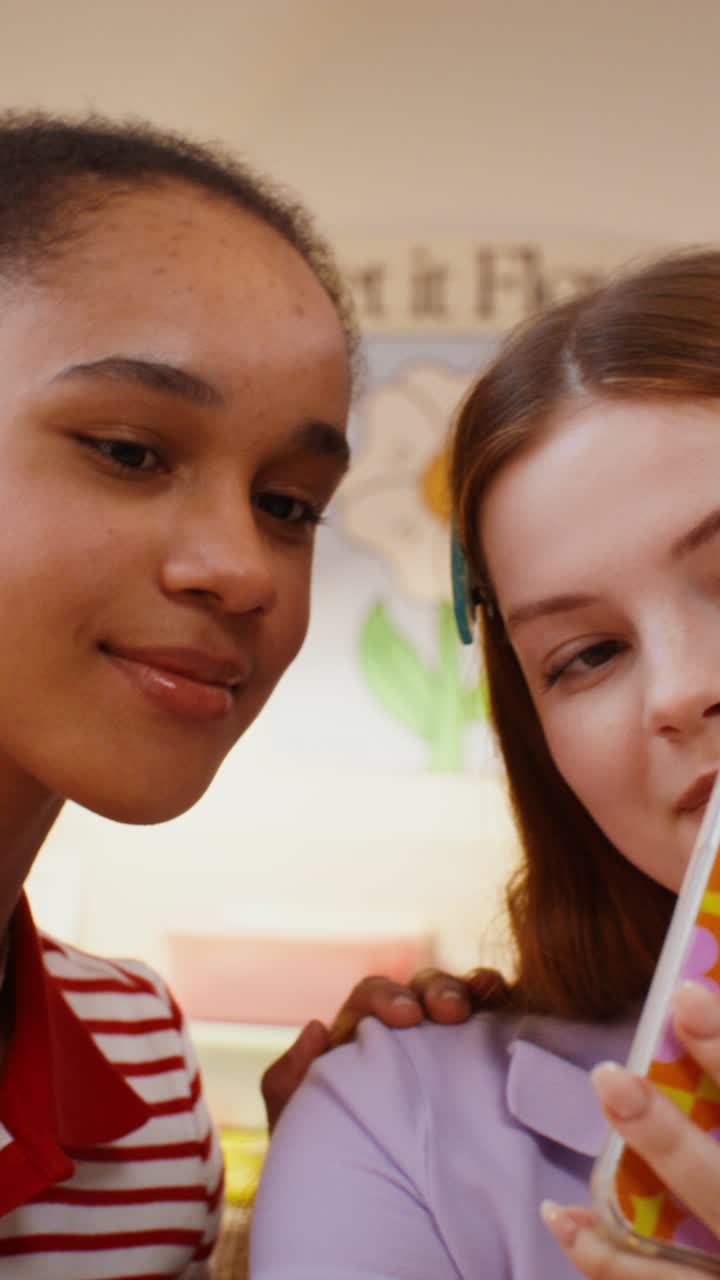 Friends Talking in a Classroom