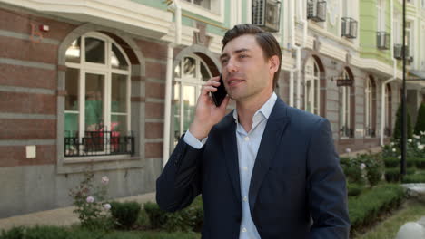 Portrait-man-having-mobile-conversation.-Man-talking-phone-about-business