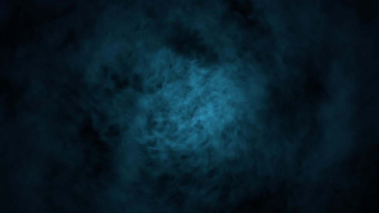 el humo retorcido de colores sopla hacia la cámara.