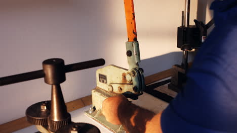 goldsmith using mini drill press