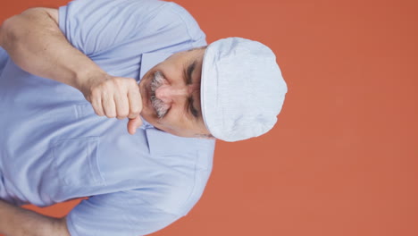 Vertical-video-of-Sick-old-man-coughing.