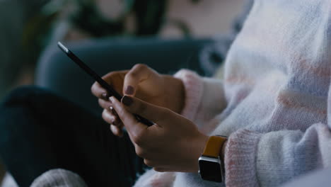 close-up-woman-hands-using-tablet-computer-browsing-social-media-checking-emails-on-mobile-touchscreen-device-relaxing-at-home