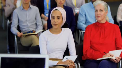 business people sitting and listening in the business seminar 4k