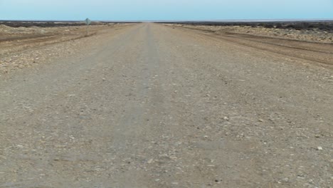 pan across a perspective down a lonely abandoned road