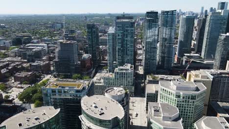 Drone-circling-over-sunny-downtown-area-of-Toronto