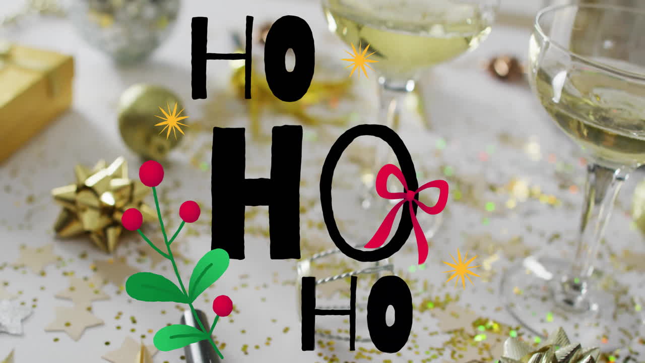 Animation of ho text over christmas decorations and glasses of wine background