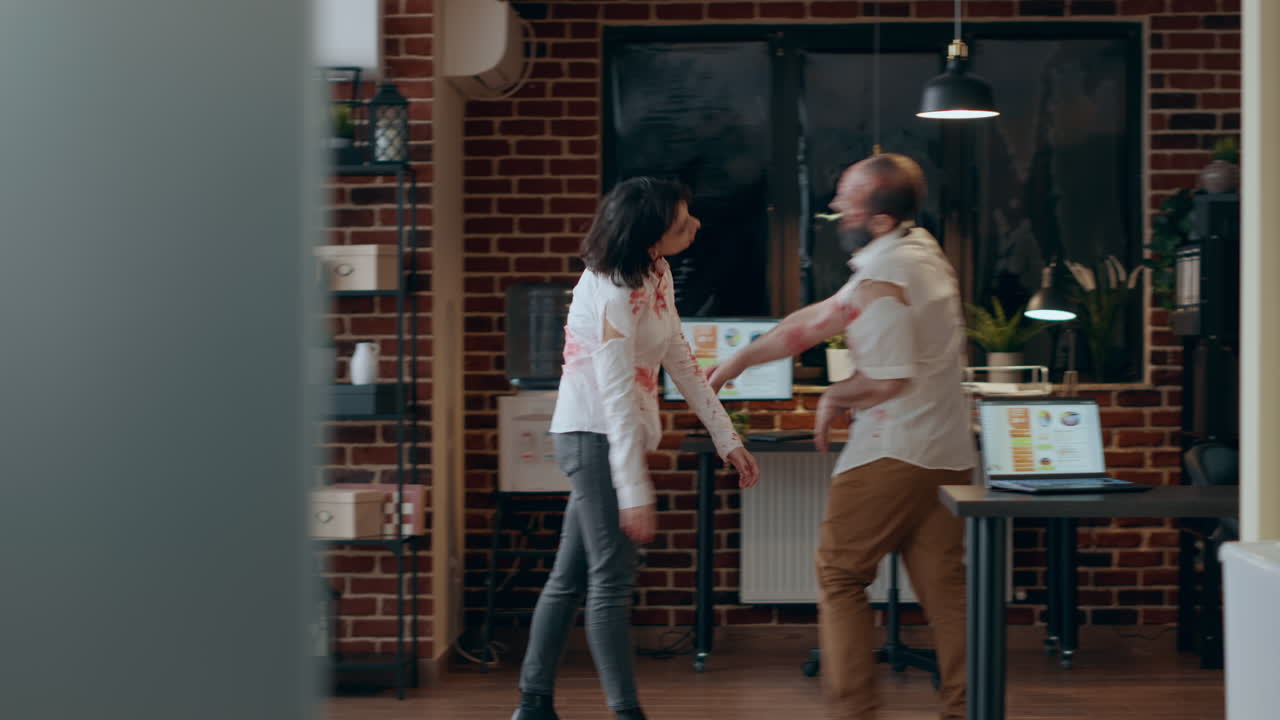 Crippled scary brain dead zombies with bloody scars wandering around office