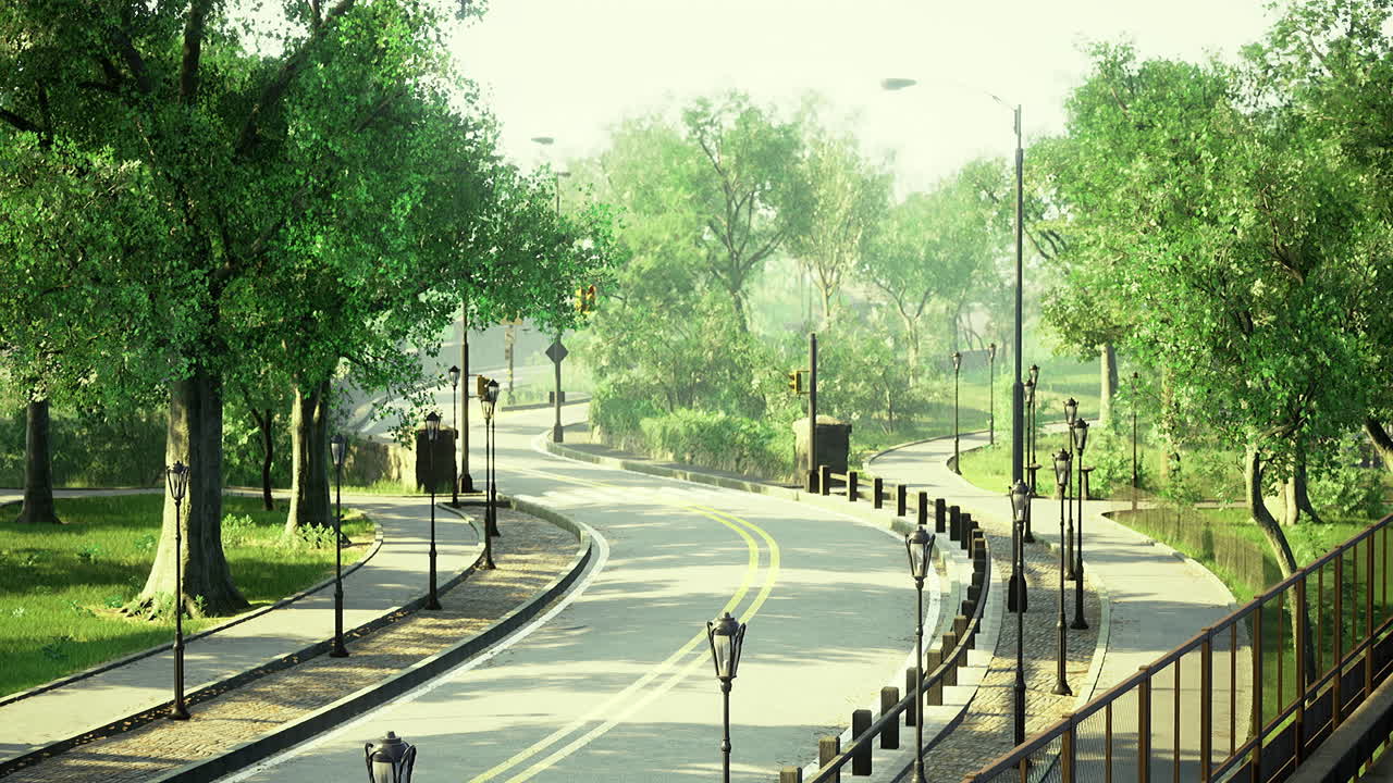 Scenic pathway through lush green park with winding road and trees