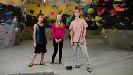 friends in a climbing gym