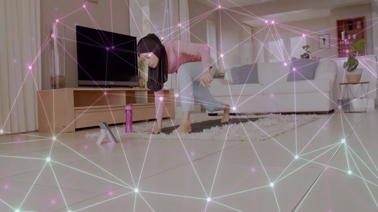 히자브를 입은 두 인종의 여성에 대한 연결 네트워크의 애니메이션 태블릿을 사용하여 운동