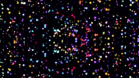 muchas partículas móviles multicolores en el espacio