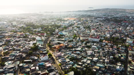 mui ne from above, overpopulated fisherman village at daytime in south vietnam