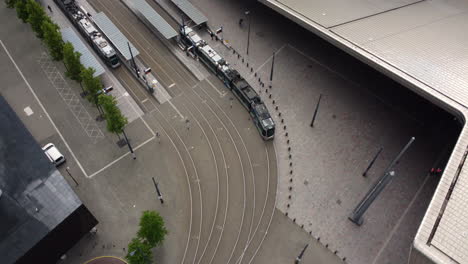 aerial view of a tram station in a european city