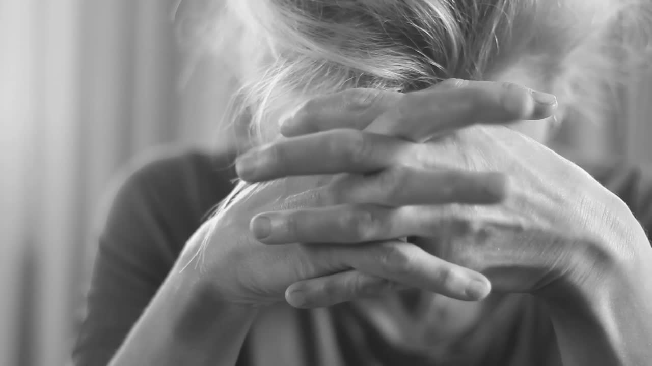 people in pain with headache woman stress stressed out and abuse with depression mental health after being bullied at work showing people stock video stock footage