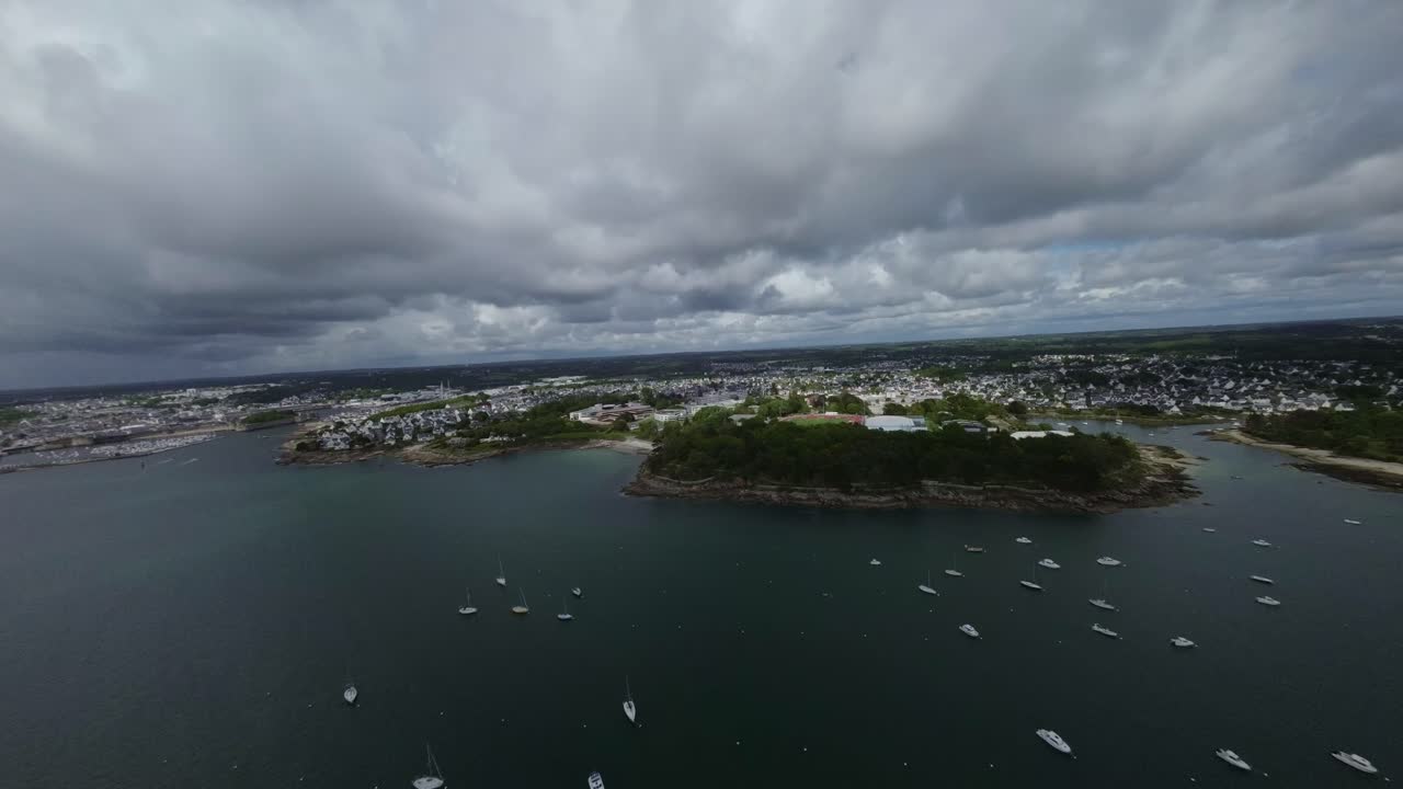 Aerial View of Coastal Town with Stadium on Peninsula
