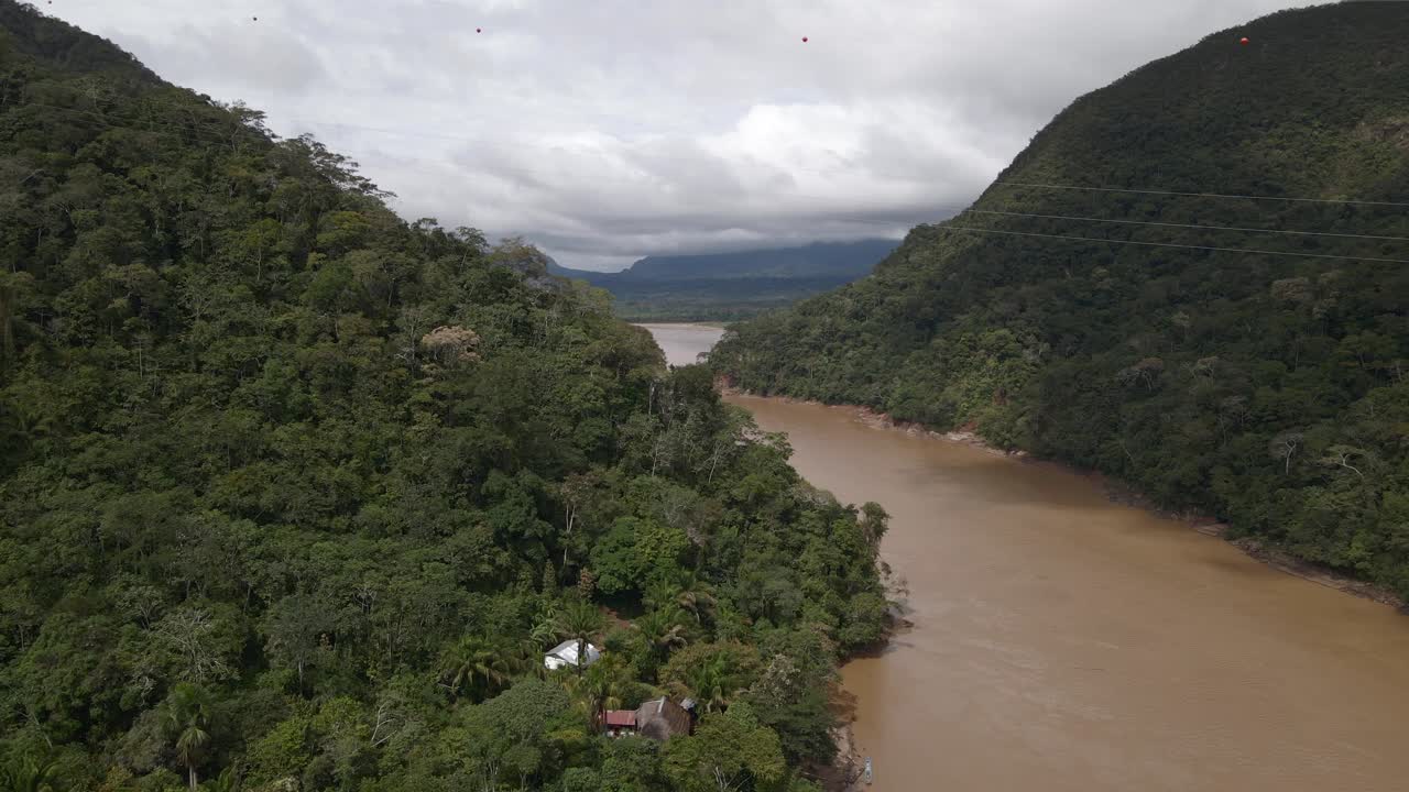 Wide aerial of the Amazon basin near Rurrenabaque, showing dense rainforest and winding rivers