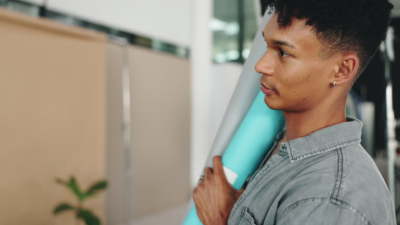 Photographer Carrying Studio Equipment