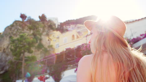 a content young woman walking around an italian