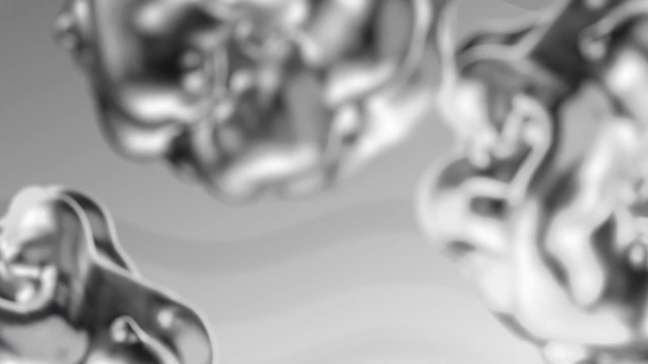 animación de formas y burbujas sobre un fondo gris en movimiento.