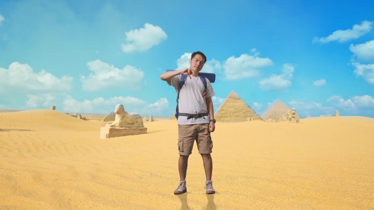 Tourist in front of the pyramids
