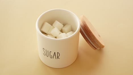 sugar cubes in a white jar